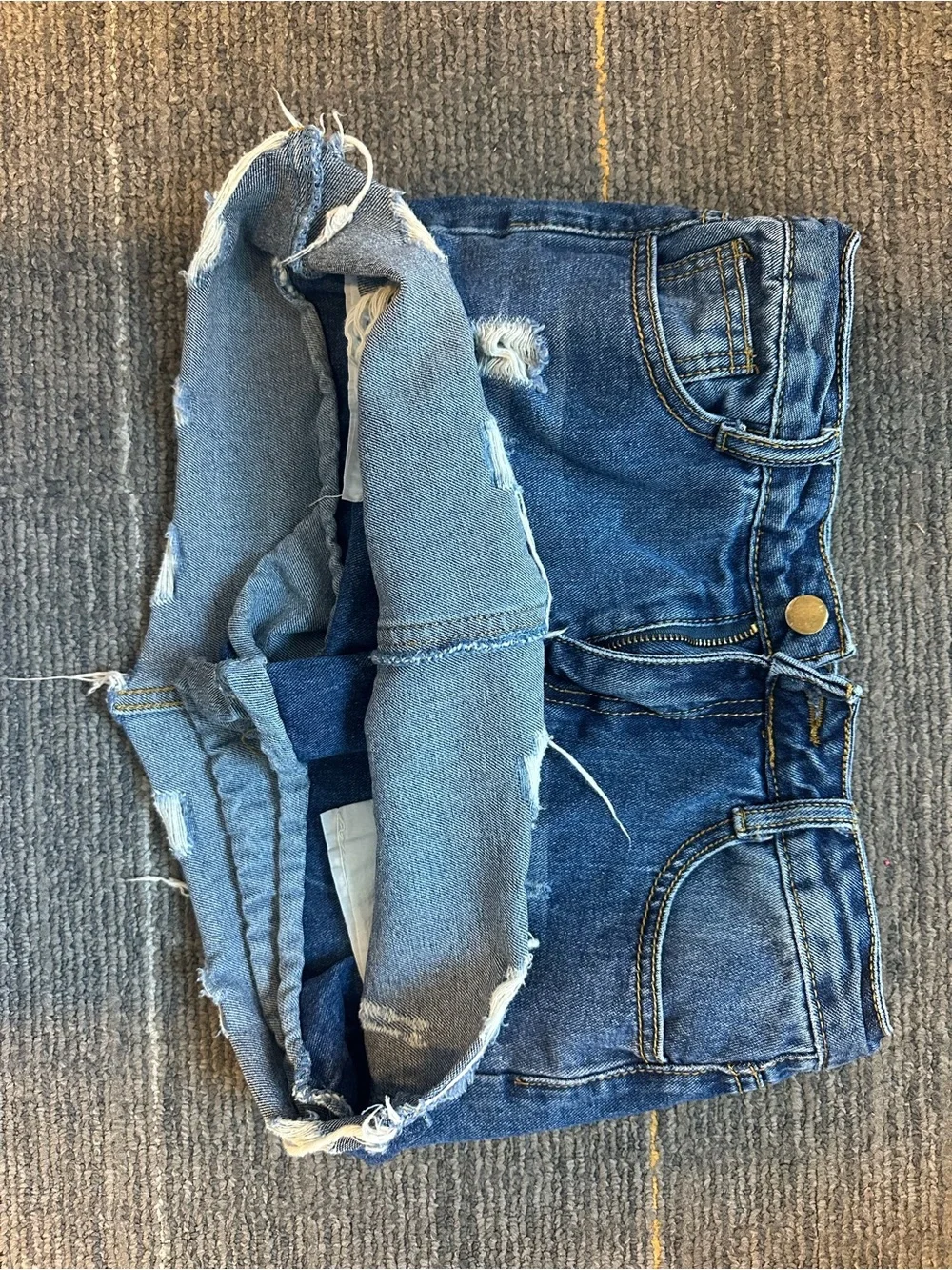 Women's Distressed Blue Denim Cutoff Shorts with Frayed Hem - Picture 2 of 3